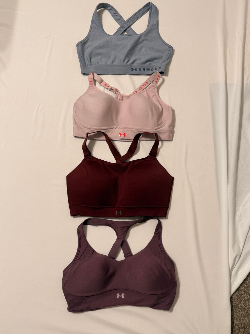 Under Armour Sports Bras Pack - Blue, Light Pink, Burgundy, Plum